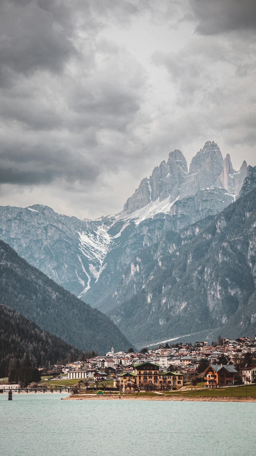 Alpine tourist town with mountains in the background