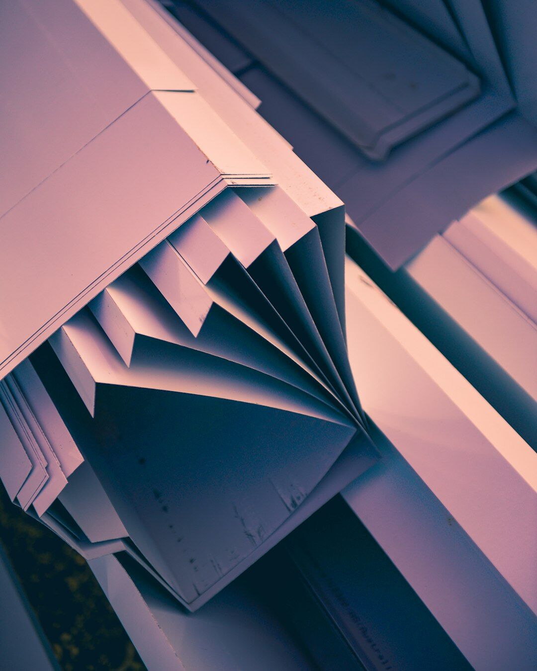 Stack of printed documents and files on a desk